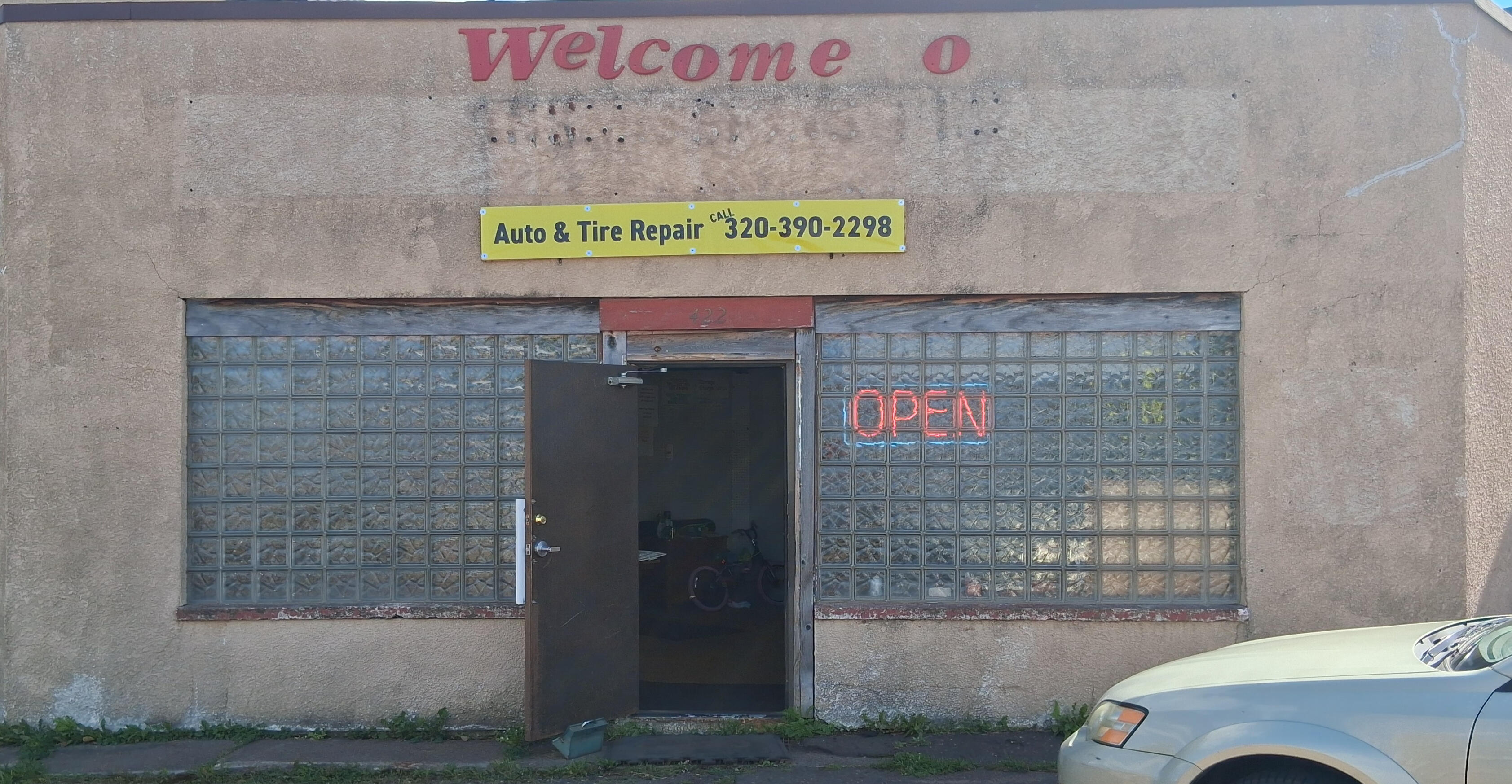 Storefront of AUTO & TIRE REPAIR 422 Main St, Sandstone, MN 55072 Open Mon-Fri 9am-5pm